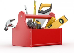 Toolbox with hammer, saw, wrench, and various tools